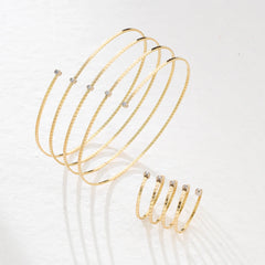 Bracciale SNAKE oro e diamanti a triplo giro