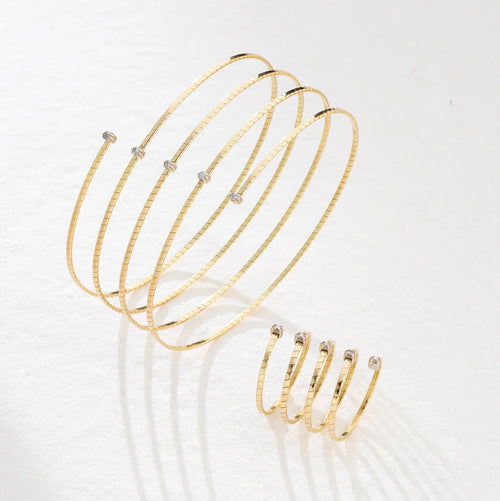 Bracciale SNAKE oro e diamanti a triplo giro