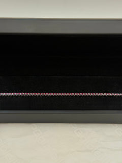 Bracciale tennis oro 9 ct e rubini rossi