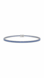 Bracciale tennis oro 9 ct e zaffiri blu