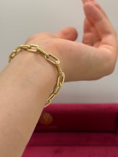 Bracciale catena lavorata-liscia oro