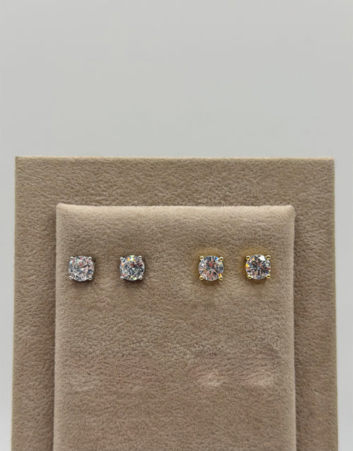 Orecchini punti luce MAN argento