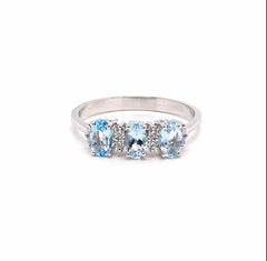 Anello trilogy oro 9ct acquamarina e diamanti