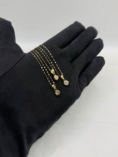 Collana punto luce tondo oro